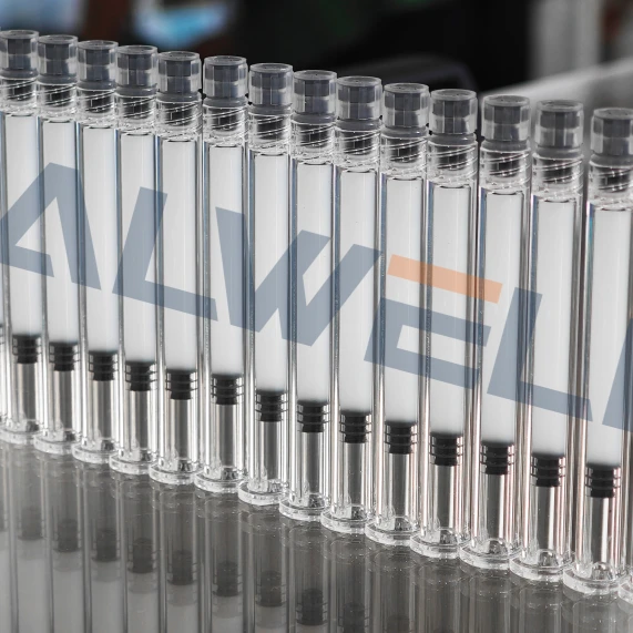 Microsphere filled syringe samples by ALWELL PFS vacuum filling and stoppering machine Microsphere filled syringe samples by ALWELL PFS vacuum filling and stoppering machine